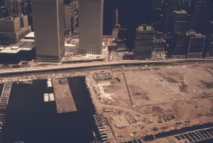 Hudson River Prints: World Trade Center in downtown Manhattan is next to a growing landfill of refuse
