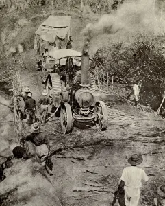 Wilderness Prints: World War 1 in Africa. Tractor pulling an armed motor boat across a bridge on its way to Lake Tanganyika in Dec