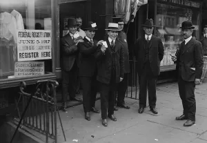 Recruitment Prints: World War 1. American men display their draft cards after registering for conscription in New York City