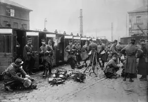 January Prints: World War 1. French troops equipped for battle at a train station