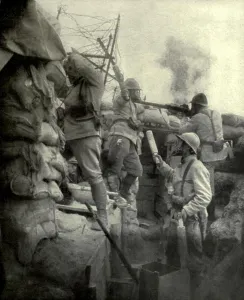 February Prints: World War 1. Somme Offensive. Two French soldiers hurling bombs (grenades) over the trench parapet