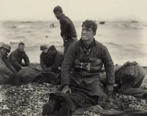 English Channel Prints: World War II. American soldiers on Omaha Beach recovering the dead after the D-Day invasion of France