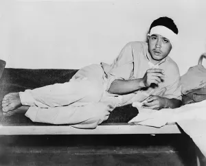 Bandage Prints: World War II, A Japanese prisoner smoking an American cigarette
