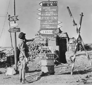 Libyan Prints: World War II, signposts printed in German and Italian point to former Axis offices
