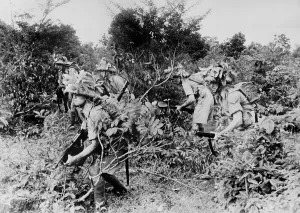 Camouflage Prints: World War II, U.S. soldiers hiding, circa 1940-1946