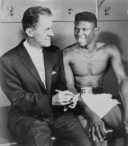 Griffith Prints: World welterweight champion Emile Griffith being interviewed by sportscaster