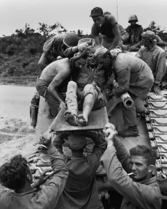 Lcgr1311 Prints: Wounded Marine is removed from a tank that carried him from the front lines on Okinawa