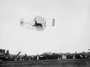 Technology Prints: Wright Model A airplane flying above spectators at Army trial flights at Fort Meyer