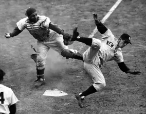 Billy Prints: Yankee Billy Martin runs into Dodger's catcher Roy Campanella for the final out of the fourth game in the 1953