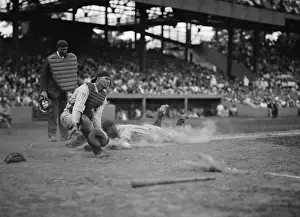 Runner Prints: Yankees Lou Gehrig scores as Joe Harris throw gets away from catcher Hank Severeid of Senators