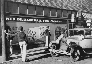 South Prints: Young African American men hanging out at a segregated billiard parlor in Leland