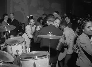 Young African Americans dancing to the live band music in Chicago, 1942