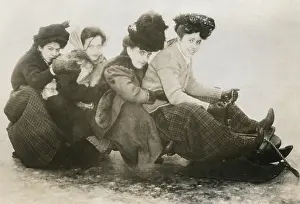 Excitement Prints: Four young American women on a sled, c