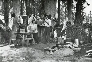Recreation Prints: Young couple camping at the Lake Basin Public Camp