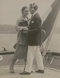 Broadcasting Prints: A young couple equipped with a portable radio outfit dancing to a broadcasted fox trot