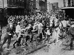 Riot Prints: Young male rioters charging a strike-breaking horse-drawn car, Feb. 19, 1910