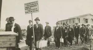 13 People Prints: Young men in civilian clothes arriving for military service at Camp Upton