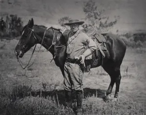 Leather Prints: Young Theodore Roosevelt dressed in buckskins beside a horse in North Dakota. 1884-85