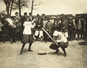 Batting Prints: Young woman baseball player ducks