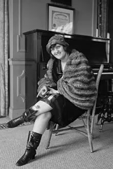 Secret Prints: Young woman hiding a flask in her high boot