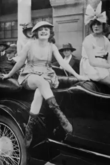 Los Angeles Prints: Three young women in bathing suits perched on a car in a Los Angeles street in the 1910s