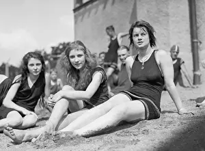 Sportswear Prints: Three young women in bathing suits on sandy beach at the Tidal Basin