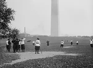 Exercise Prints: Young women in bloomers and middy shirts playing baseball on the National Mall
