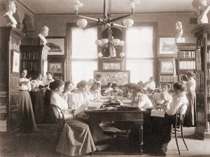 Learning Prints: Young women reading in library of a Washington