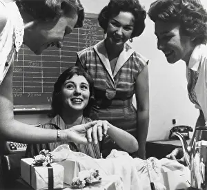 Postwar Boom Prints: Young working women at an office party for an engaged co-worker