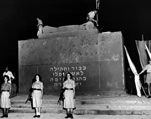 Guard Prints: Two youths light the eternal flame on top of Haifa's monument honoring those killed in the battle for Haifa one