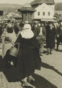 Veils Prints: Yugoslavian Islamic woman in niqab and burqa carrying basket in Sarajevo